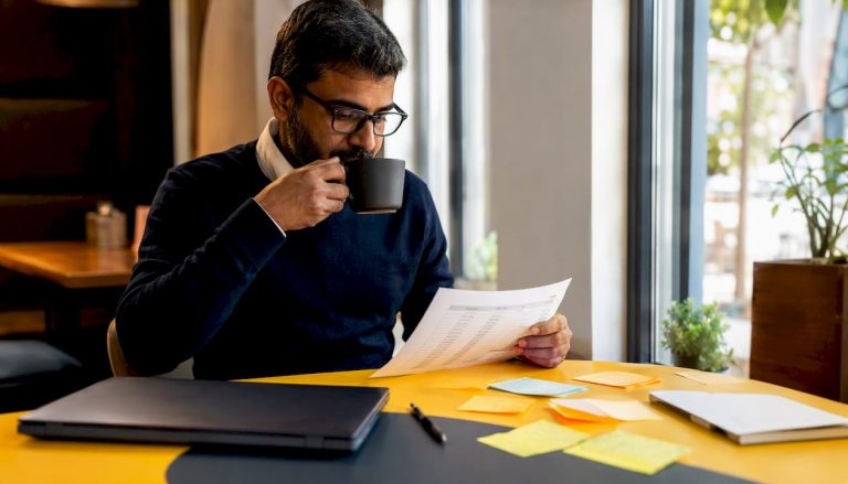 SMB employee managing passwords at desk