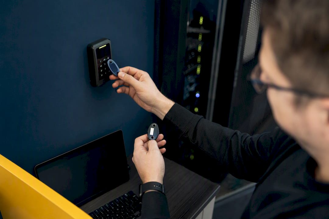 Hands holding multi-factor authentication token
